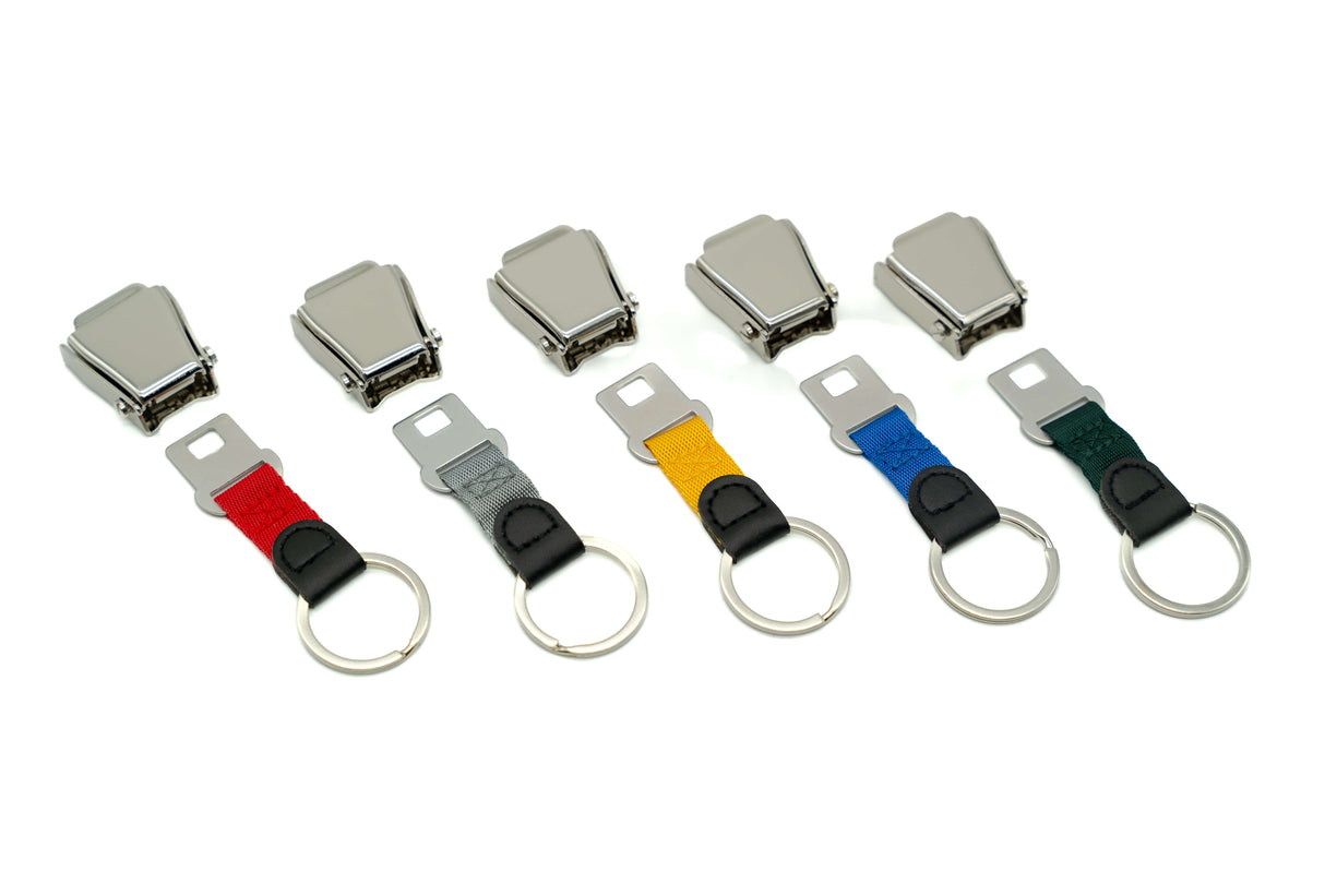 Cumoli - Schlüsselanhänger Flugzeuggurtschnalle