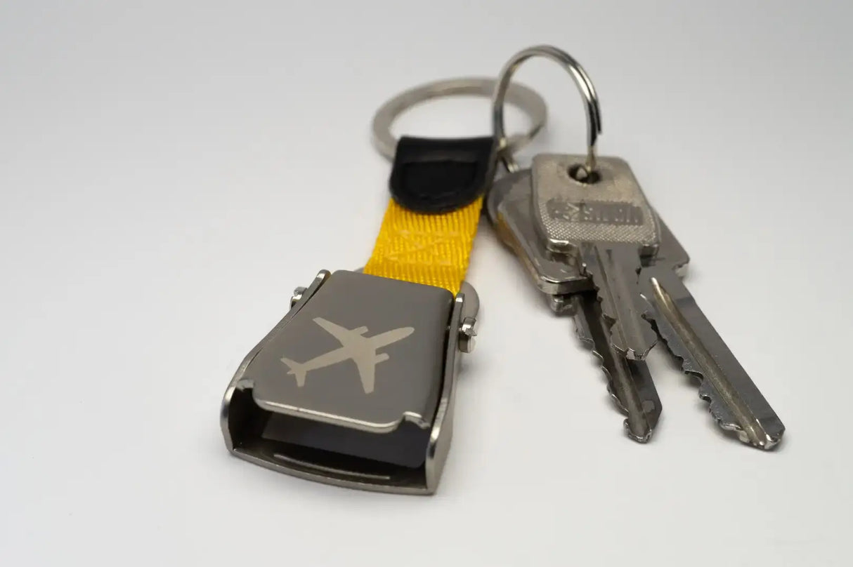 Schlüsselanhänger Flugzeuggurtschnalle mit Flaschenöffner
